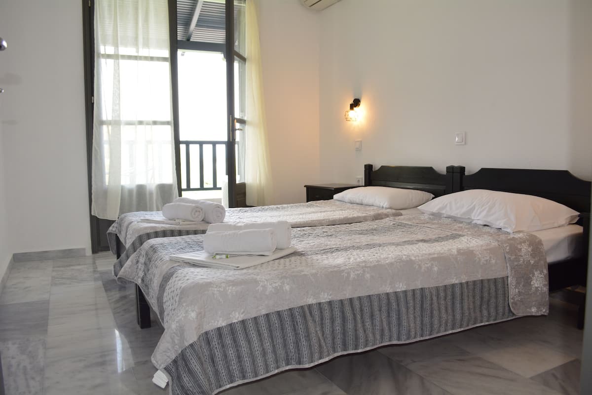 Apartment, Sea View | Blackout drapes, iron/ironing board, rollaway beds, free WiFi