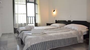 Appartement, vue sur la mer | Rideaux d’obscurcissement, fer et planche à repasser