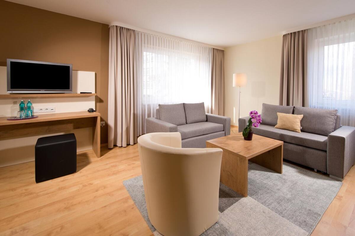 comfort double room (plus) | living room | flat-screen tv
