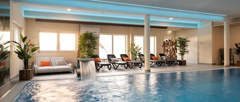 Indoor pool, open noon to 8:00 PM, pool loungers