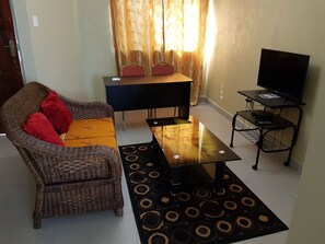 Apartment, 2 Bedrooms | Living room | 32-inch TV with satellite channels - Sumbulwa Apartments (Livingstone)