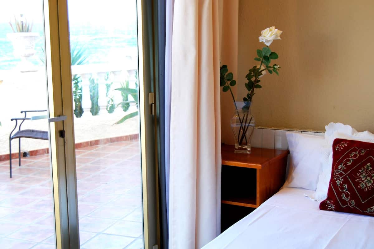triple room (orientada al mar) | premium bedding, down duvets, memory-foam beds, individually decorated