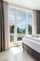 Panoramic Apartment, 1 Bedroom, Pool Access, Beachside | 1 bedroom, premium bedding, in-room safe, desk