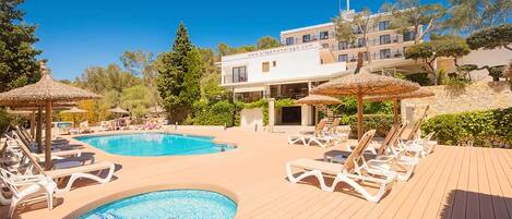 Outdoor pool, pool umbrellas, pool loungers