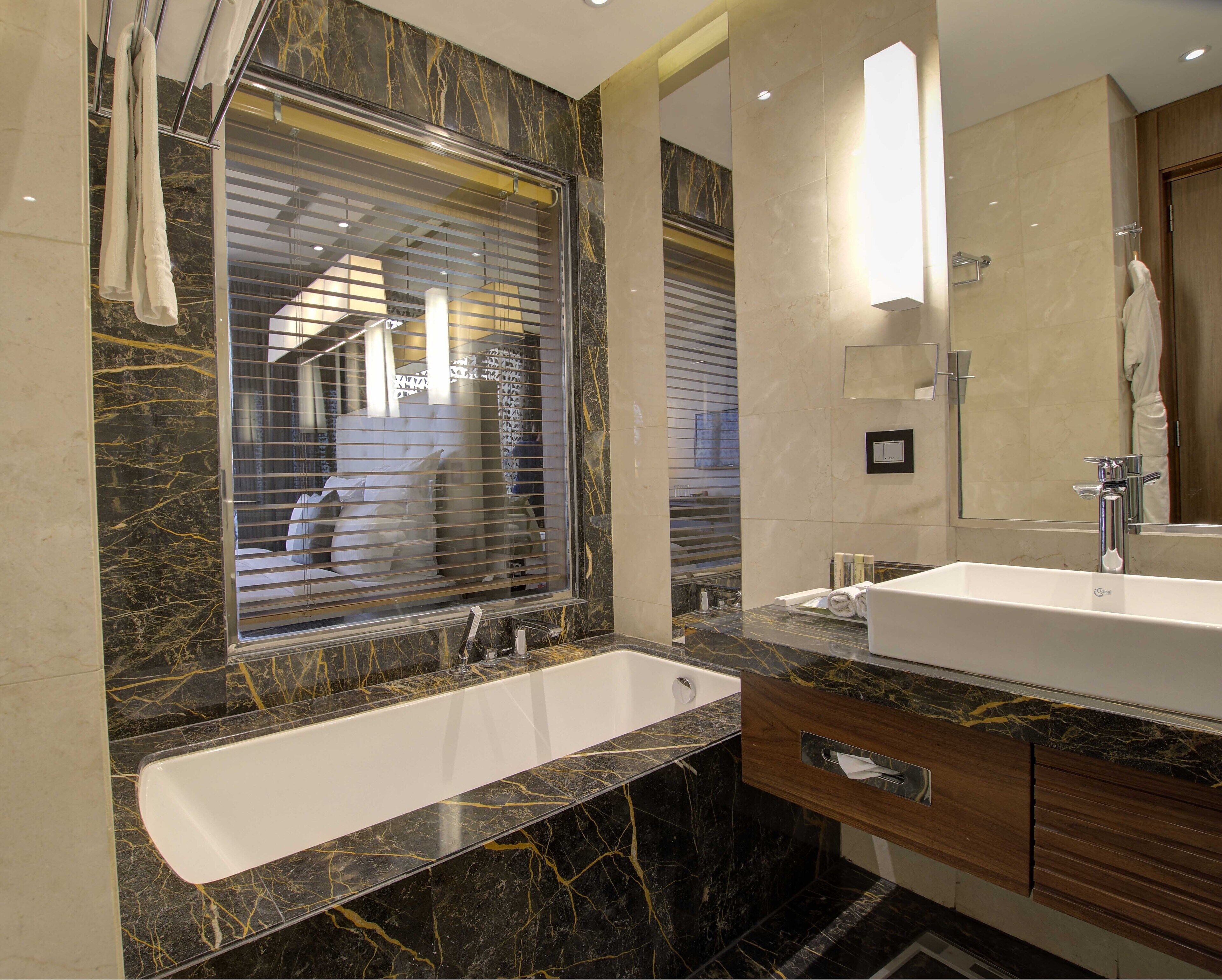 combined shower/bathtub, free toiletries, hair dryer, bathrobes