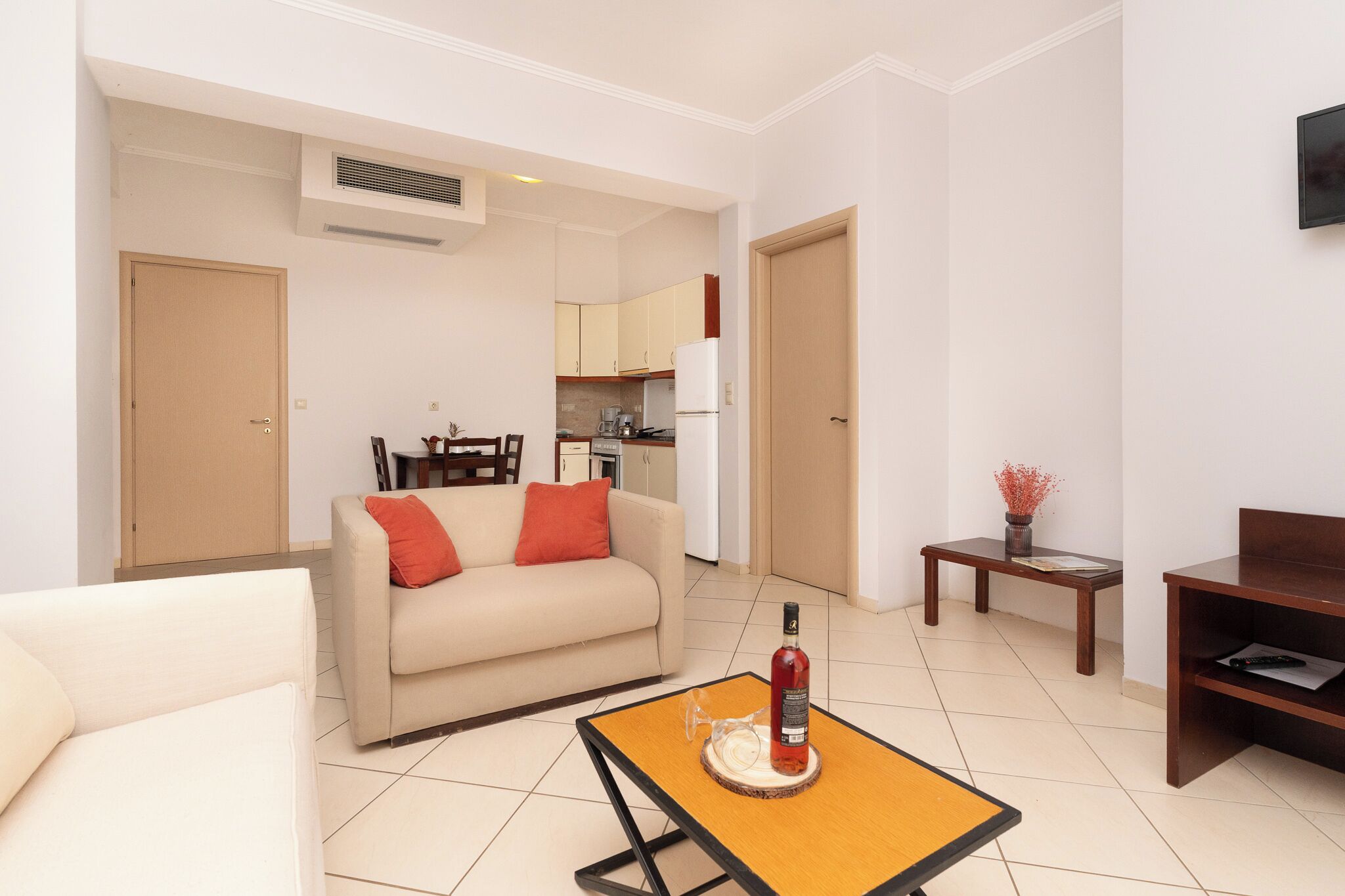 Apartamento, 1 quarto, vista para o mar | Área de estar | TV de tela plana