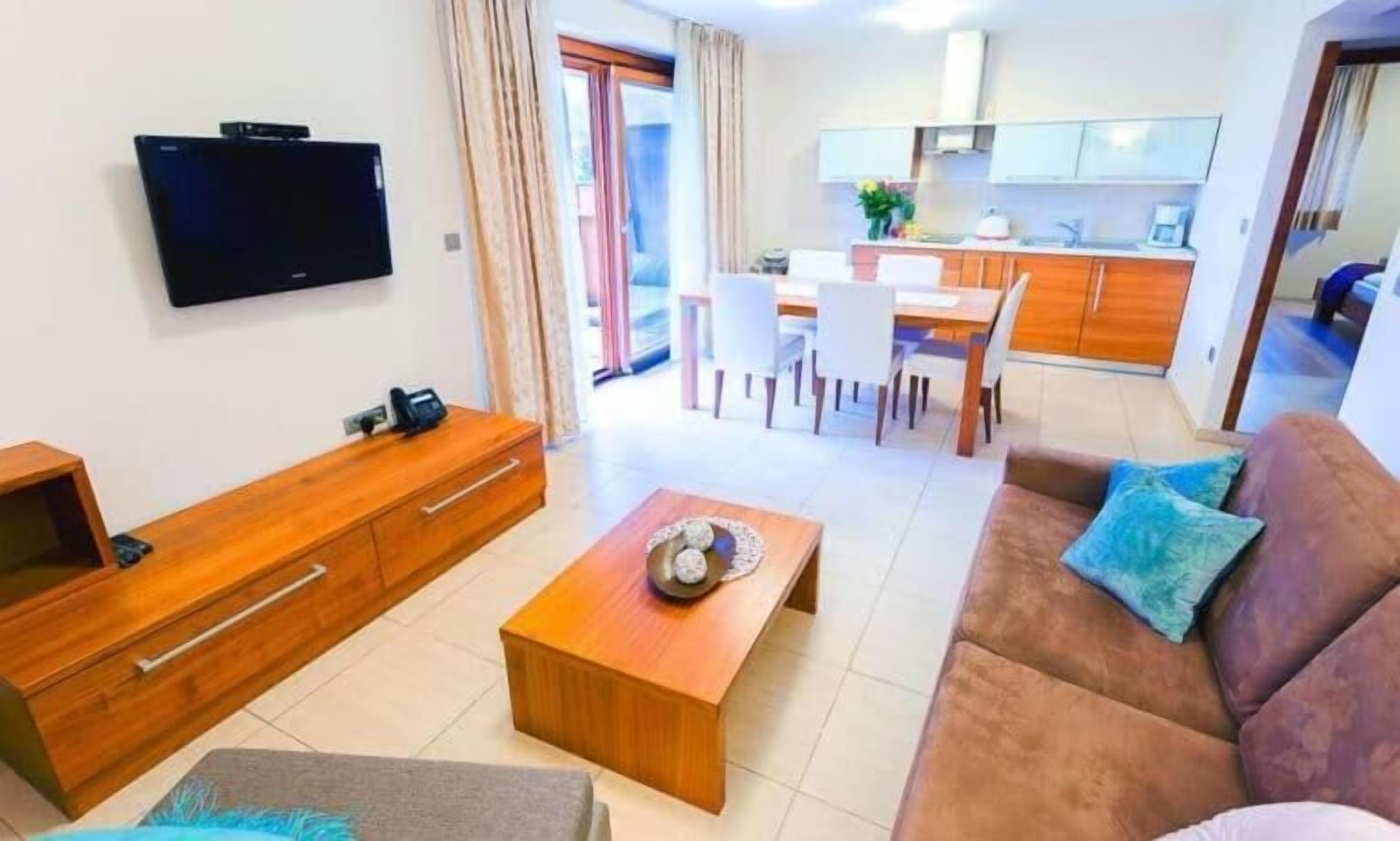 apartment, 1 bedroom, balcony | living room | flat-screen tv