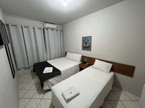 Standard Triple Room | Minibar, desk, free WiFi