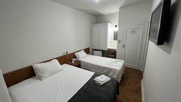 Standard Triple Room | Minibar, desk, free WiFi