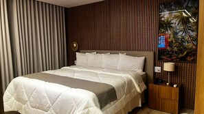 Premium Suite | Minibar, desk, free WiFi, bed sheets - Hotel Amsterdam Montes Claros (Montes Claros)