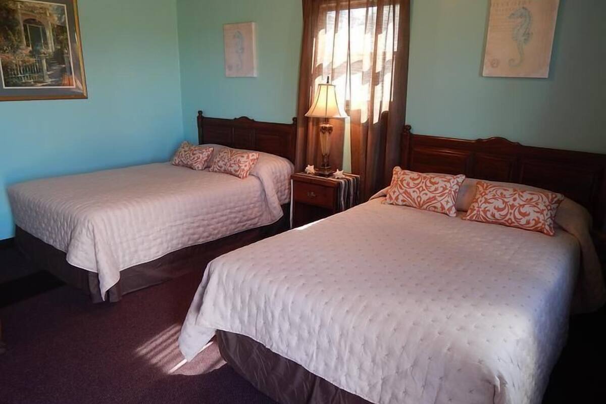 Family Room, 2 Double Beds | Individually decorated, individually furnished