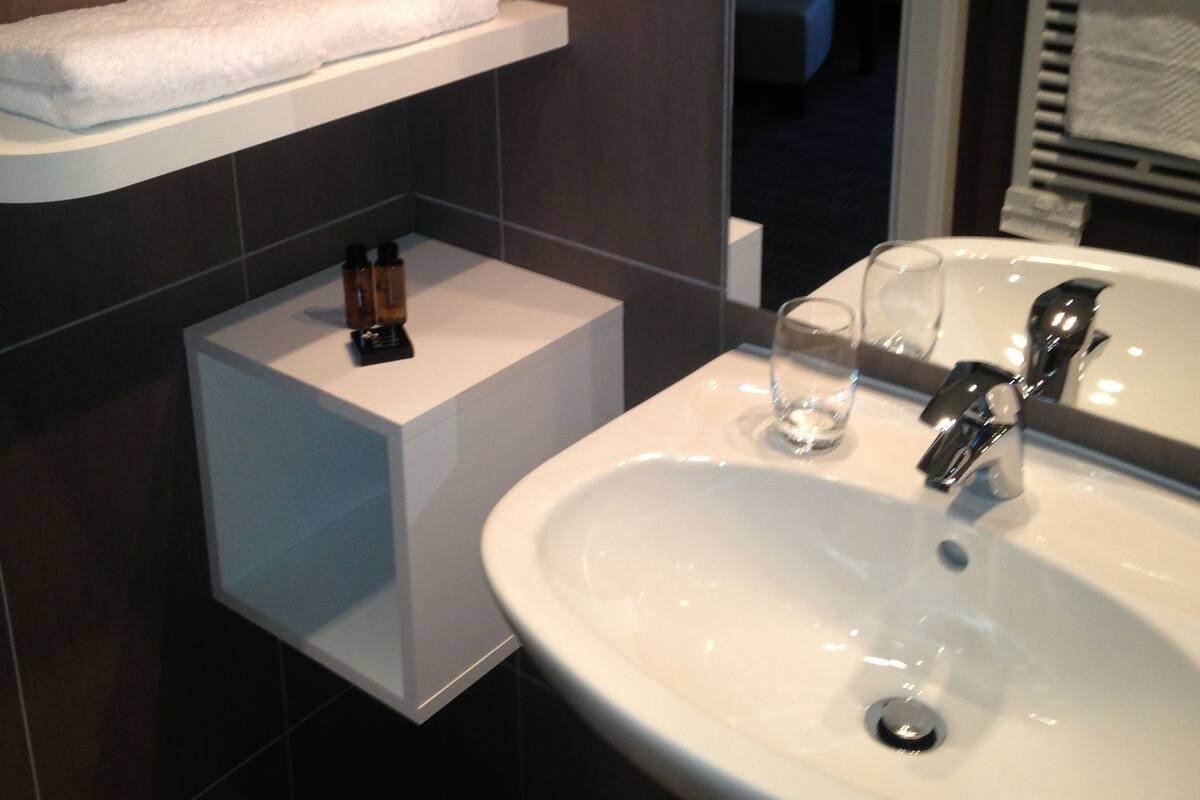 free toiletries, hair dryer, dressing gowns, towels