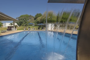 Outdoor pool, pool umbrellas, pool loungers