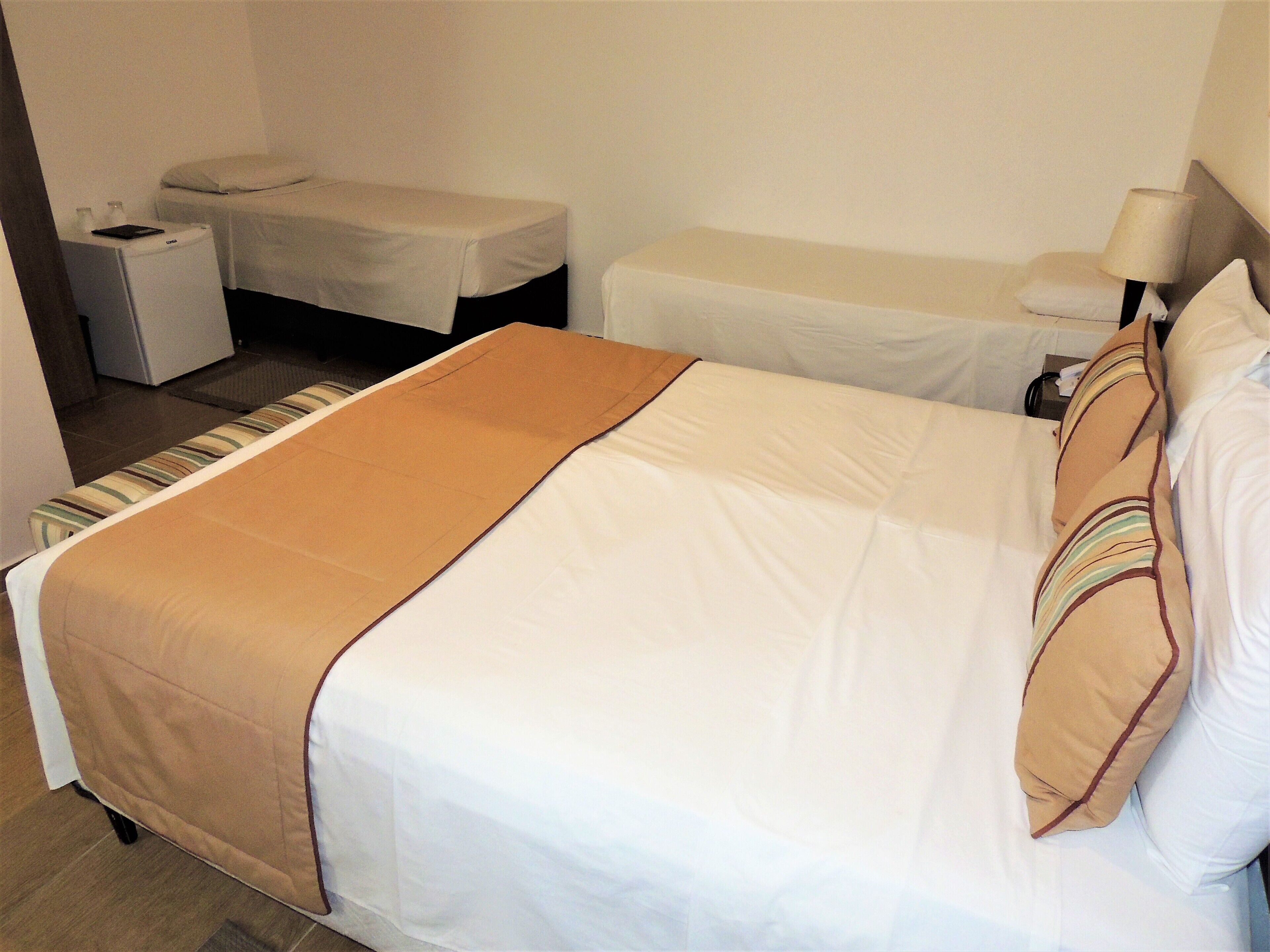 standard quadruple room | 1 bedroom, minibar, individually decorated, desk