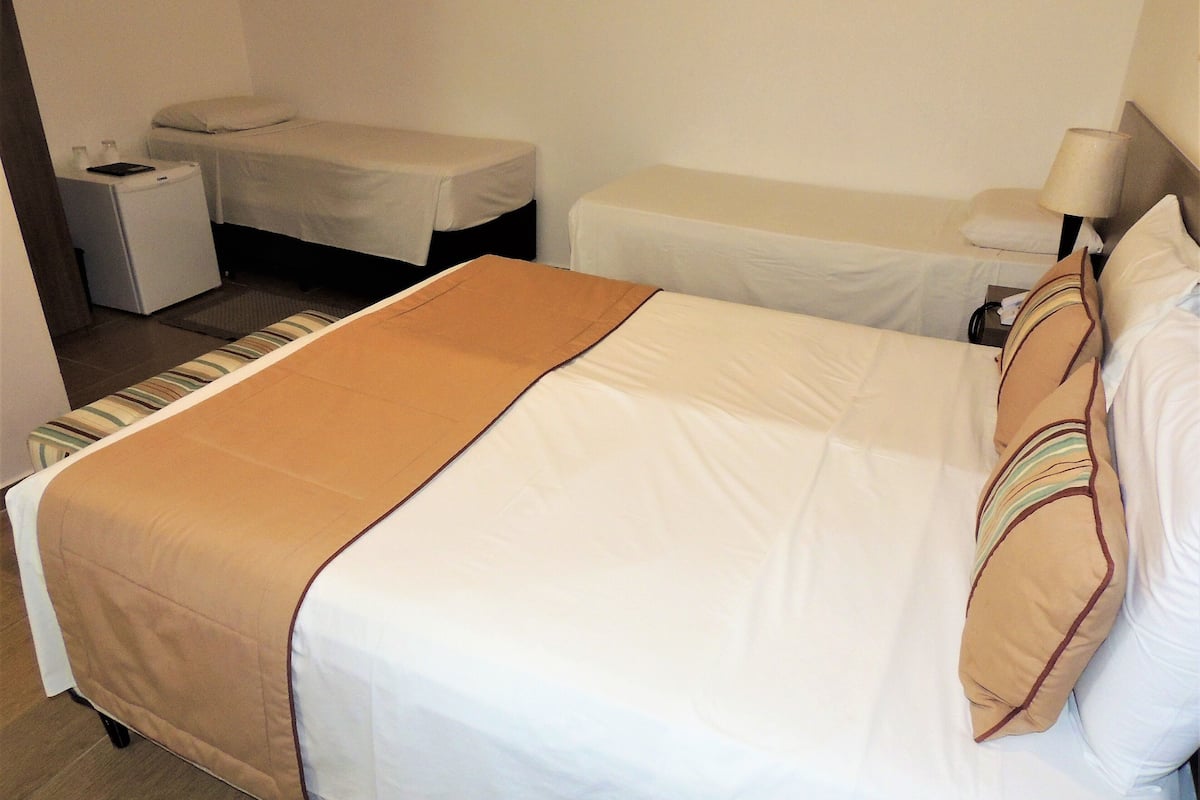 standard quadruple room | 1 bedroom, minibar, individually decorated, desk