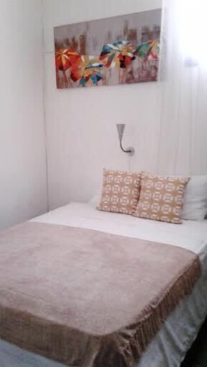 Quarto triplo | Banheiro | Chuveiro, toalhas de banho