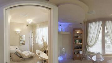 Relax in a serene space with a large mirror, clear chair, and ample storage for your essentials.