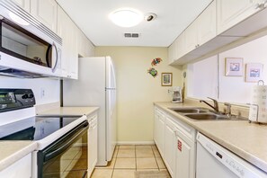House, 2 Bedrooms | Private kitchen | Full-size fridge, microwave, oven, stovetop - Endless Ocean Views in S Fletcher Duplex by RedAwning (Fernandina Beach)