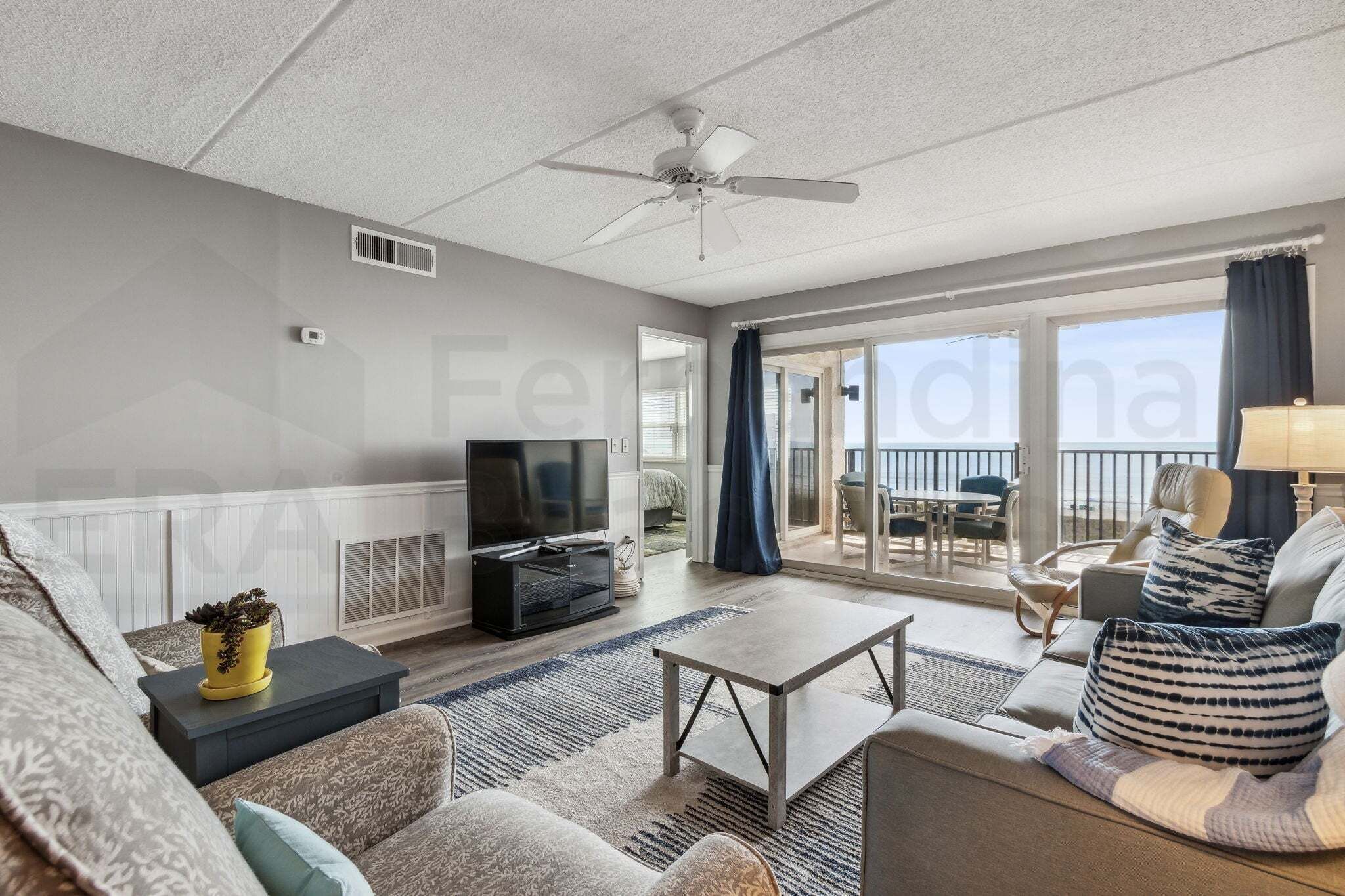 Condo, 2 Bedrooms | Living area | Flat-screen TV, DVD player