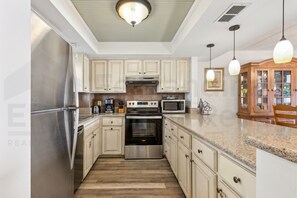 Condo, 2 Bedrooms | Private kitchen | Full-size fridge, microwave, oven, stovetop