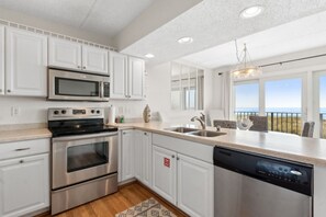 Condo, 2 Bedrooms | Private kitchen | Full-sized fridge, microwave, oven, stovetop