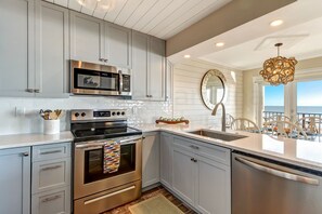 Condo, 2 Bedrooms | Private kitchen - Gorgeous Oceanfront Views Condo with On Site Pool and Fully Covered Parking by RedAwning (Fernandina Beach)