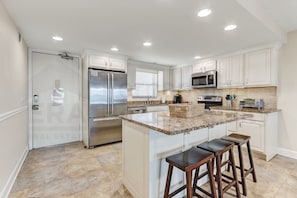 Condo, 2 Bedrooms | Private kitchen | Full-sized fridge, microwave, oven, stovetop - Upper unit Overlooking the Beautiful Outdoor Space and Pier by RedAwning (Fernandina Beach)