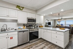 Condo, 3 Bedrooms | Private kitchen | Full-size fridge, microwave, oven, stovetop