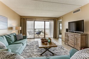 Condo, 2 Bedrooms | Living area | TV, DVD player - Comfy Upper Unit Condo to Enjoy the Beach or the Fishing by RedAwning (Fernandina Beach)