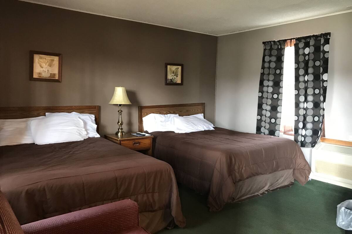 Ropa de cama de alta calidad y tabla de planchar con plancha
