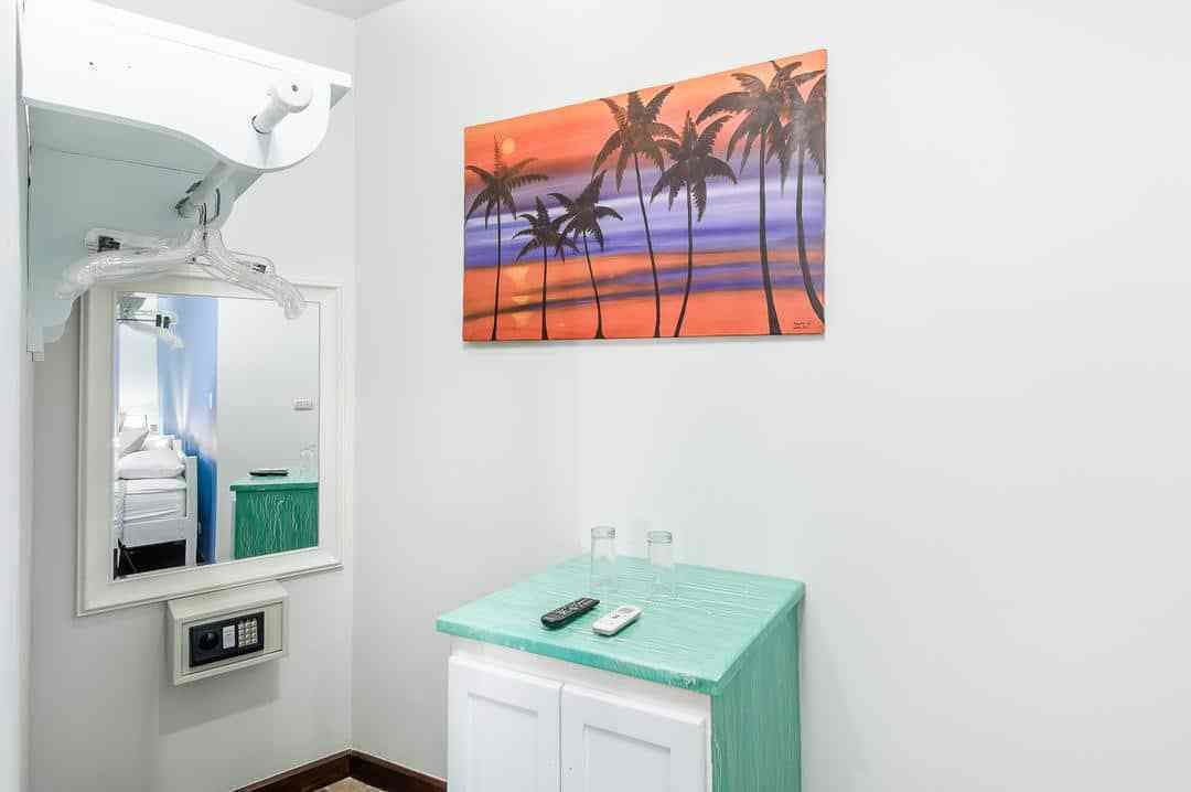 surf room | bathroom | shower, hydromassage showerhead, hair dryer, towels