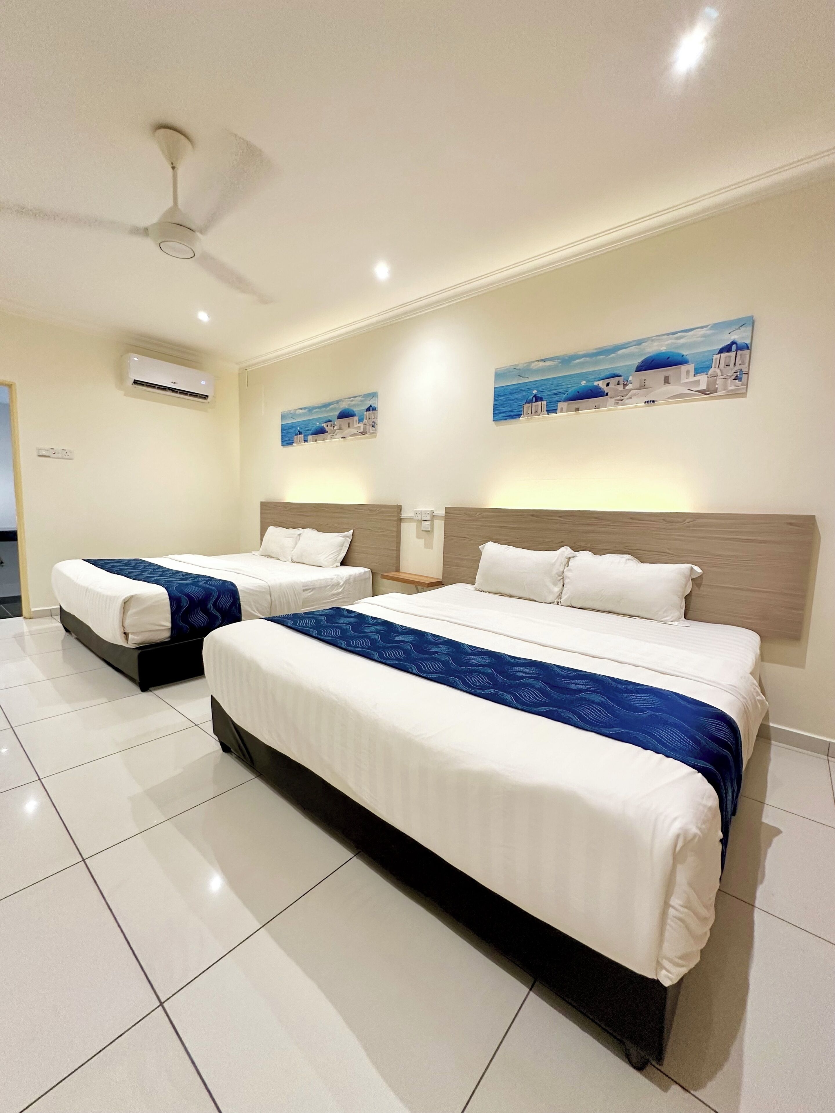 Family Room, Garden View | Minibar, desk, free WiFi, bed sheets