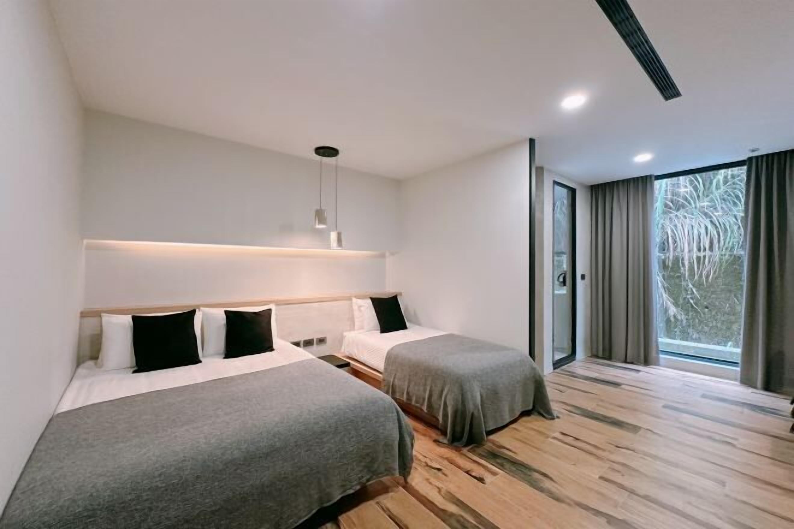 Premium bedding, desk, blackout drapes, soundproofing