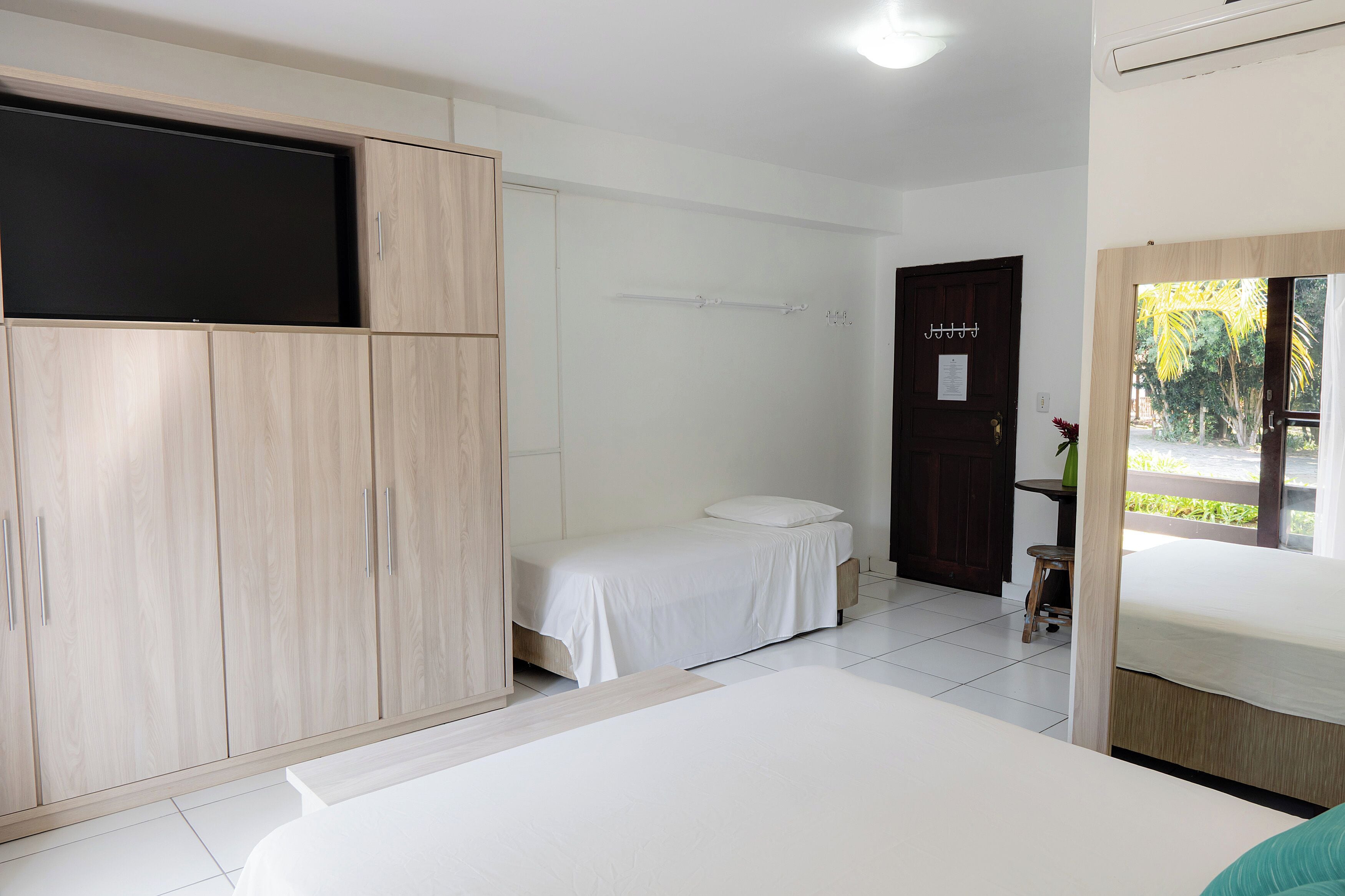 suite, garden view | minibar, desk, blackout curtains, free wifi