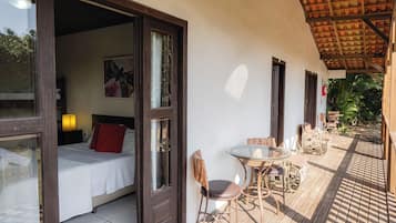 Suite, Garden View | Minibar, desk, blackout drapes, free WiFi