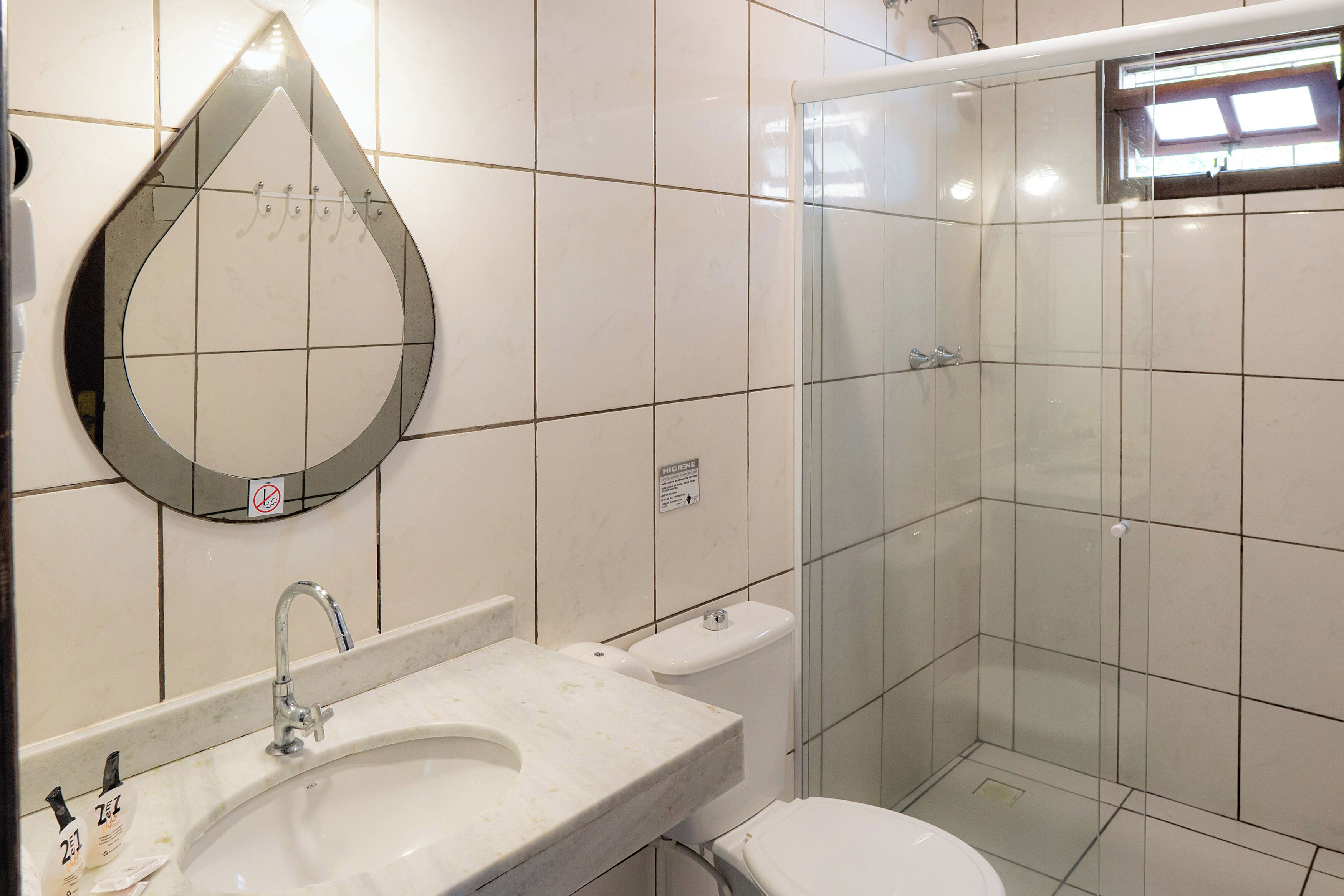 suite, garden view | bathroom | shower, free toiletries, towels