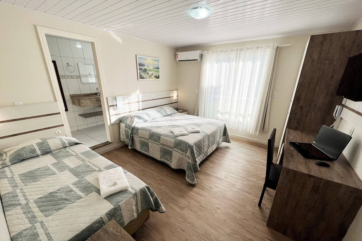 Family Triple Room, 1 Bedroom | Minibar, in-room safe, desk, iron/ironing board (on request)
