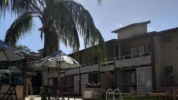 Outdoor pool, pool umbrellas, sun loungers