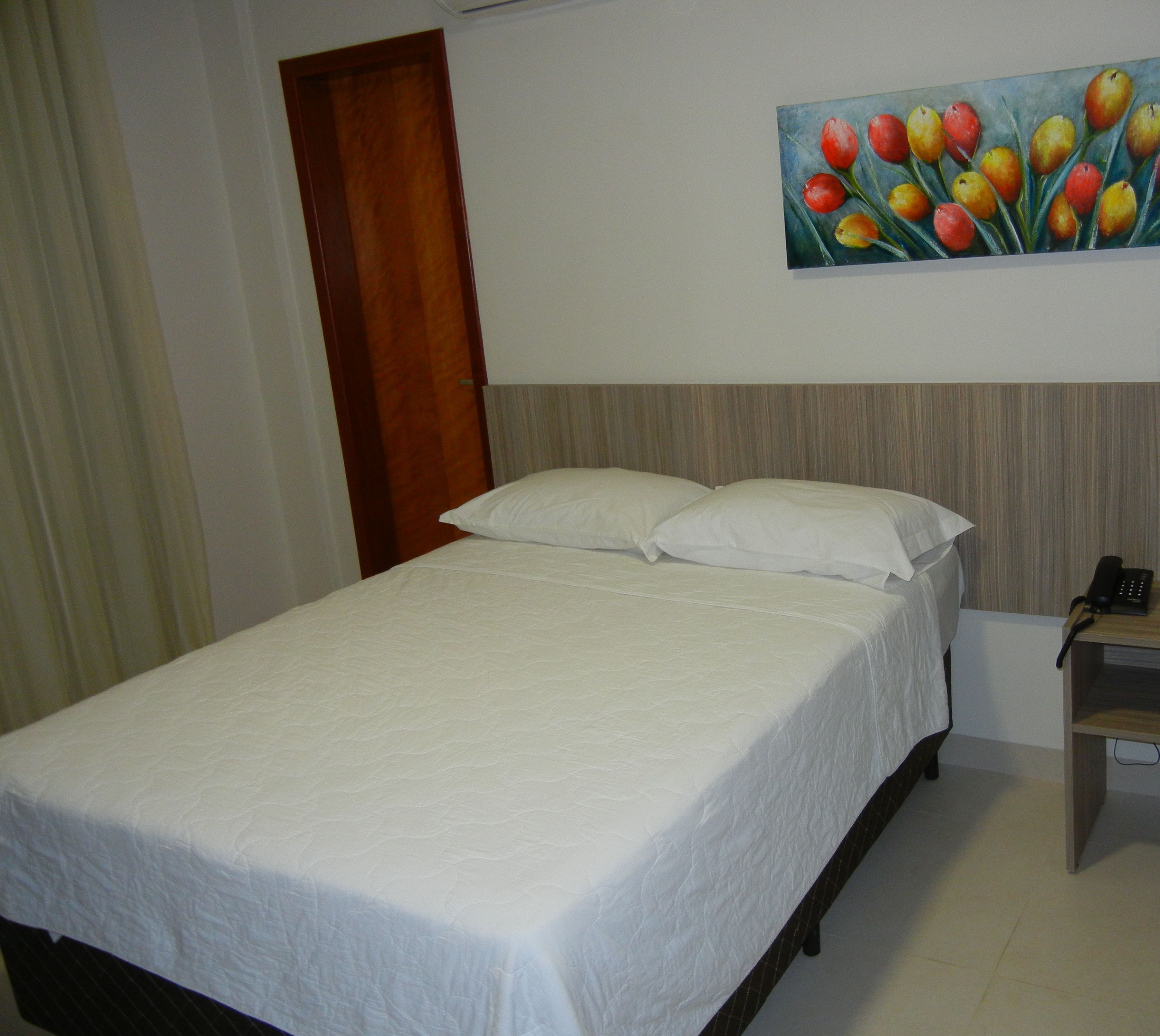 Quarto casal | Frigobar, escrivaninha, cortinas blackout, Wi-Fi de cortesia