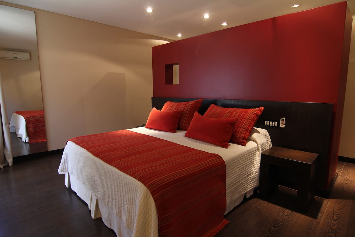 superior suite | premium bedding, in-room safe, desk, iron/ironing board