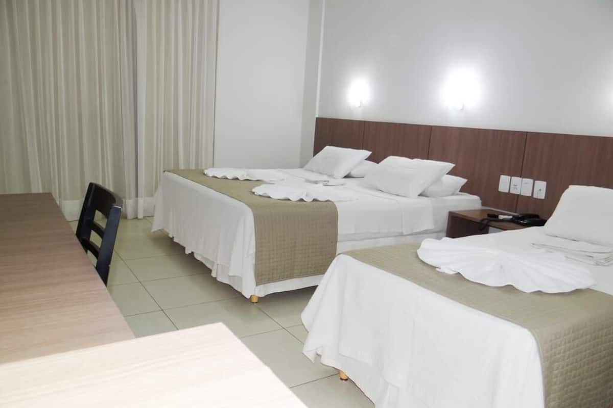 standard triple room | 1 bedroom, minibar, desk, blackout curtains