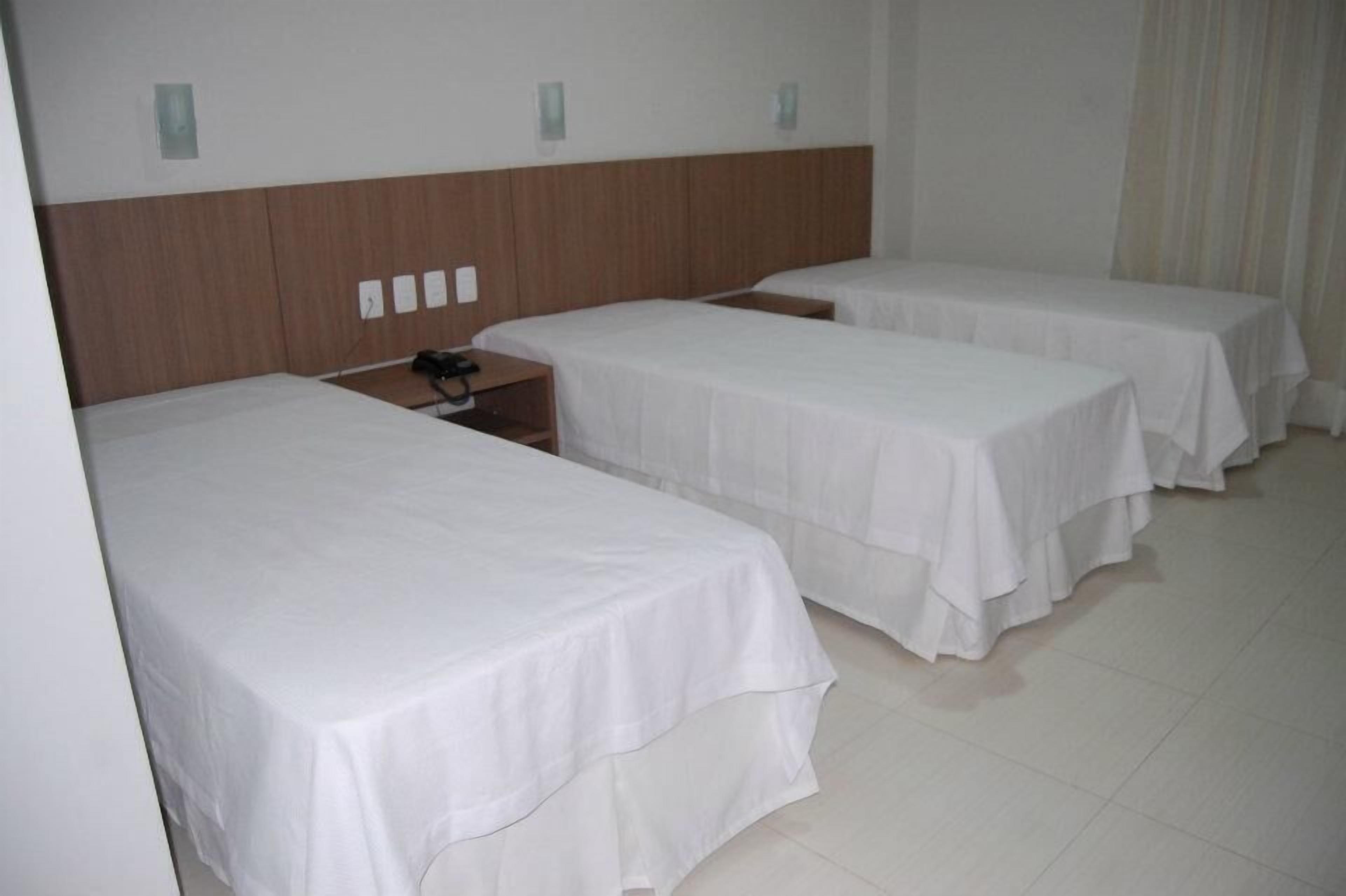 standard triple room | 1 bedroom, minibar, desk, blackout curtains