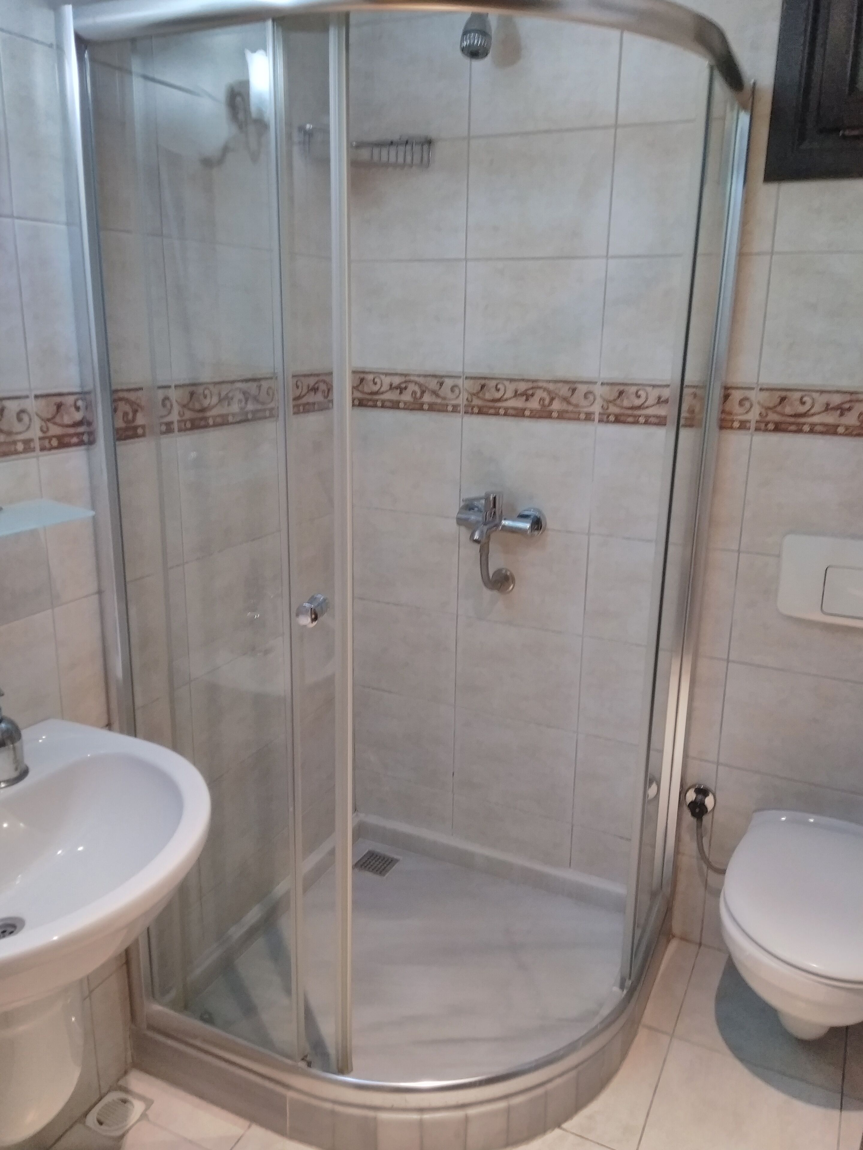 family room | bathroom | shower, free toiletries, hair dryer, slippers