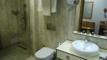 Shower, free toiletries, hair dryer, slippers