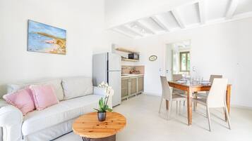 Apartment, 1 Bedroom, Sea View, Annex Building (Hestia) | Living area | 32-inch LCD TV with digital channels, TV