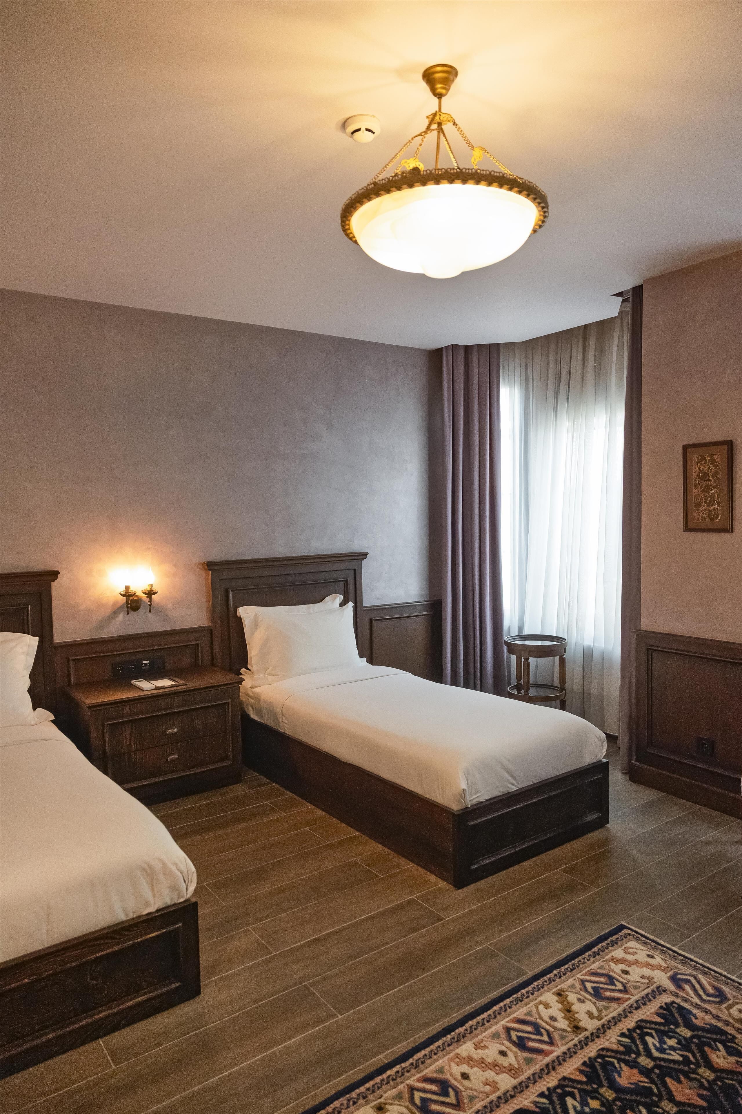 Tiled Mansion | Premium bedding, down comforters, minibar, in-room safe