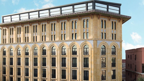 A historic building with multiple arched windows and a balcony on the upper floor. - AJWA Sultanahmet (Istanbul)