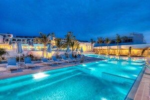 Indoor pool, outdoor pool, pool umbrellas, sun loungers