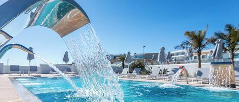 Indoor pool, outdoor pool, pool umbrellas, sun loungers