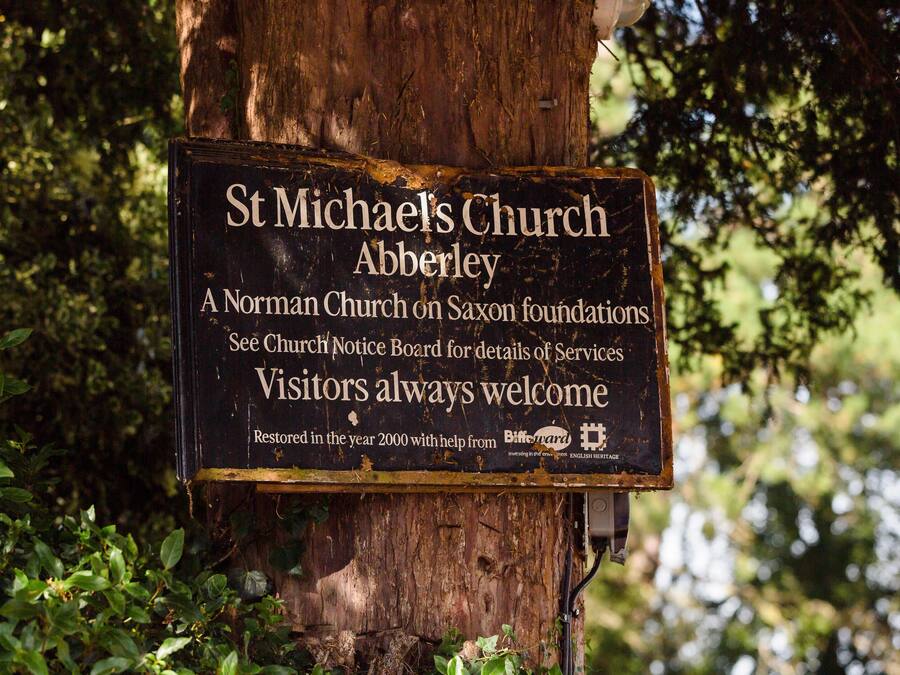 A sign for St Michael's Church Abberley, a Norman Church on Saxon foundations, restored in 2000 with help from the Benevolent Society.